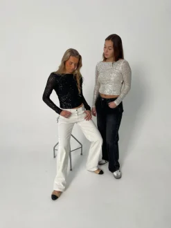 Babette pallietbluse med åben ryg - Sølv