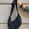 Cia skuldertaske med polka prikker - Sort