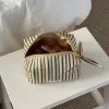 Honey lille toilettaske med striber - Beige/grøn