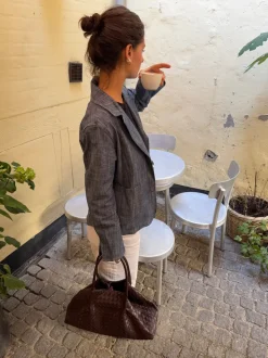 Milu skuldertaske i flet - Brun
