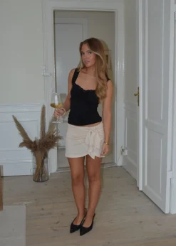 Stassy mininederdel med bindedetalje - Beige